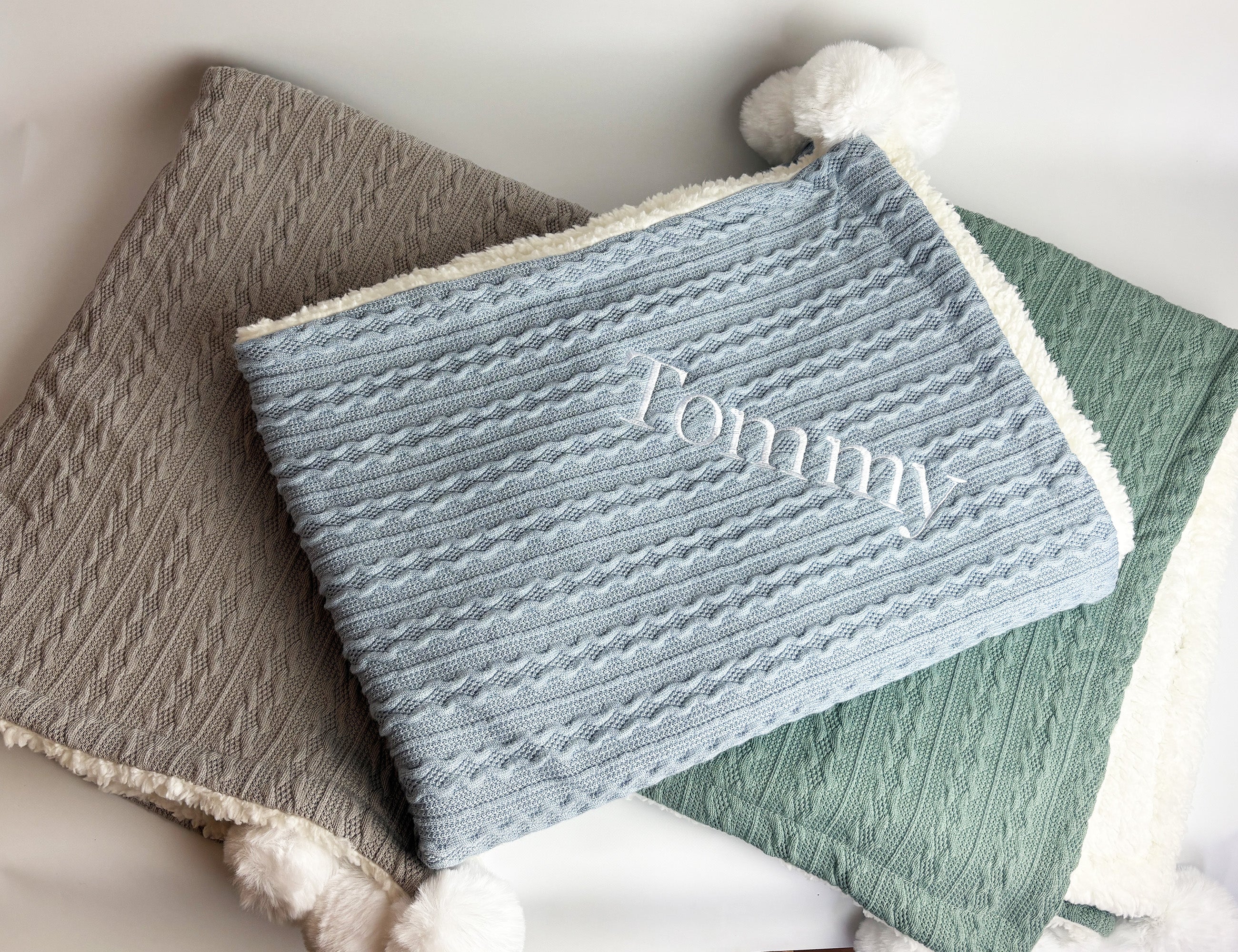 Blue baby blanket with custom embroidered name